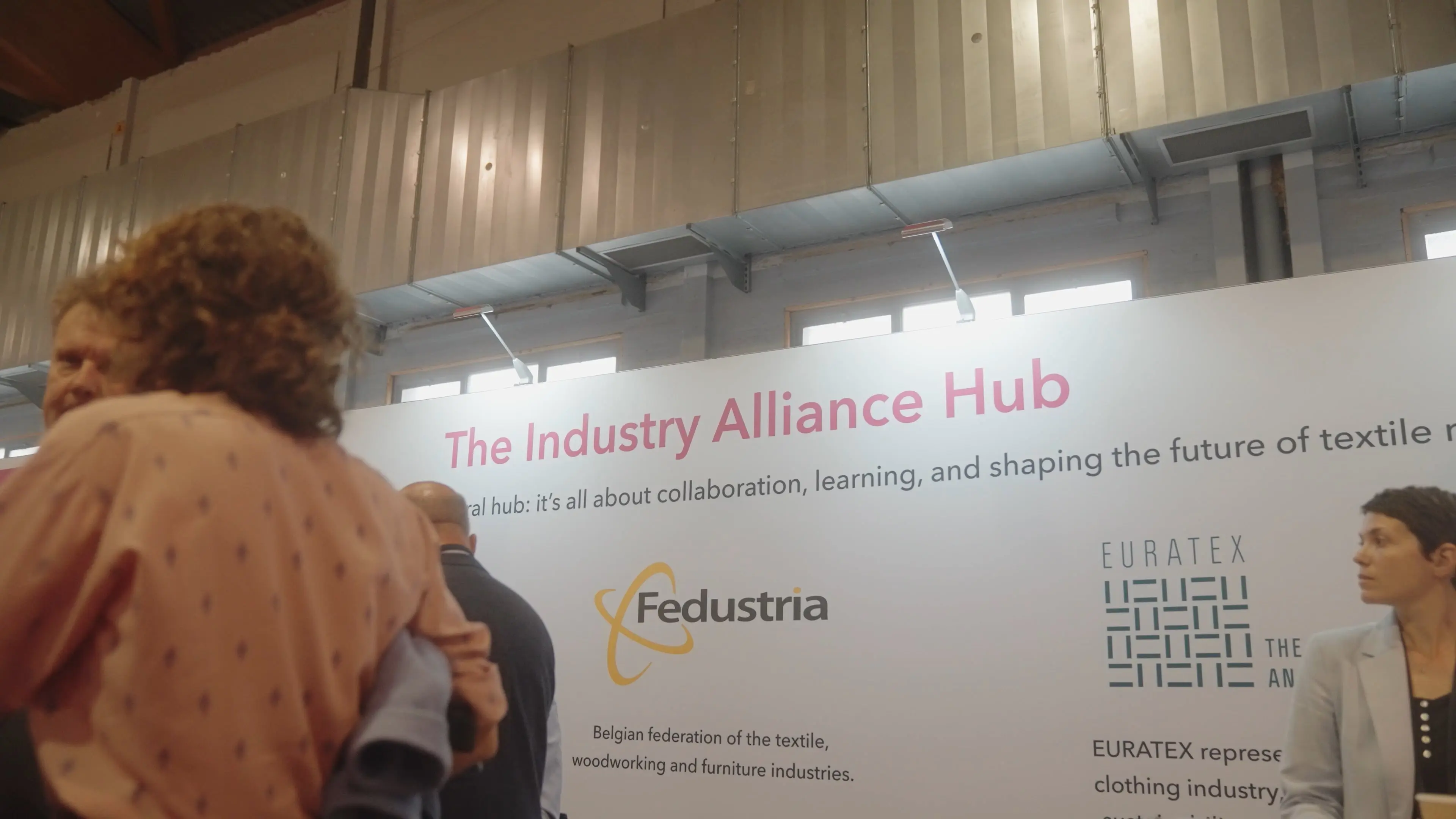 Frozen image from start of AMIs Brussels expo video June 2025