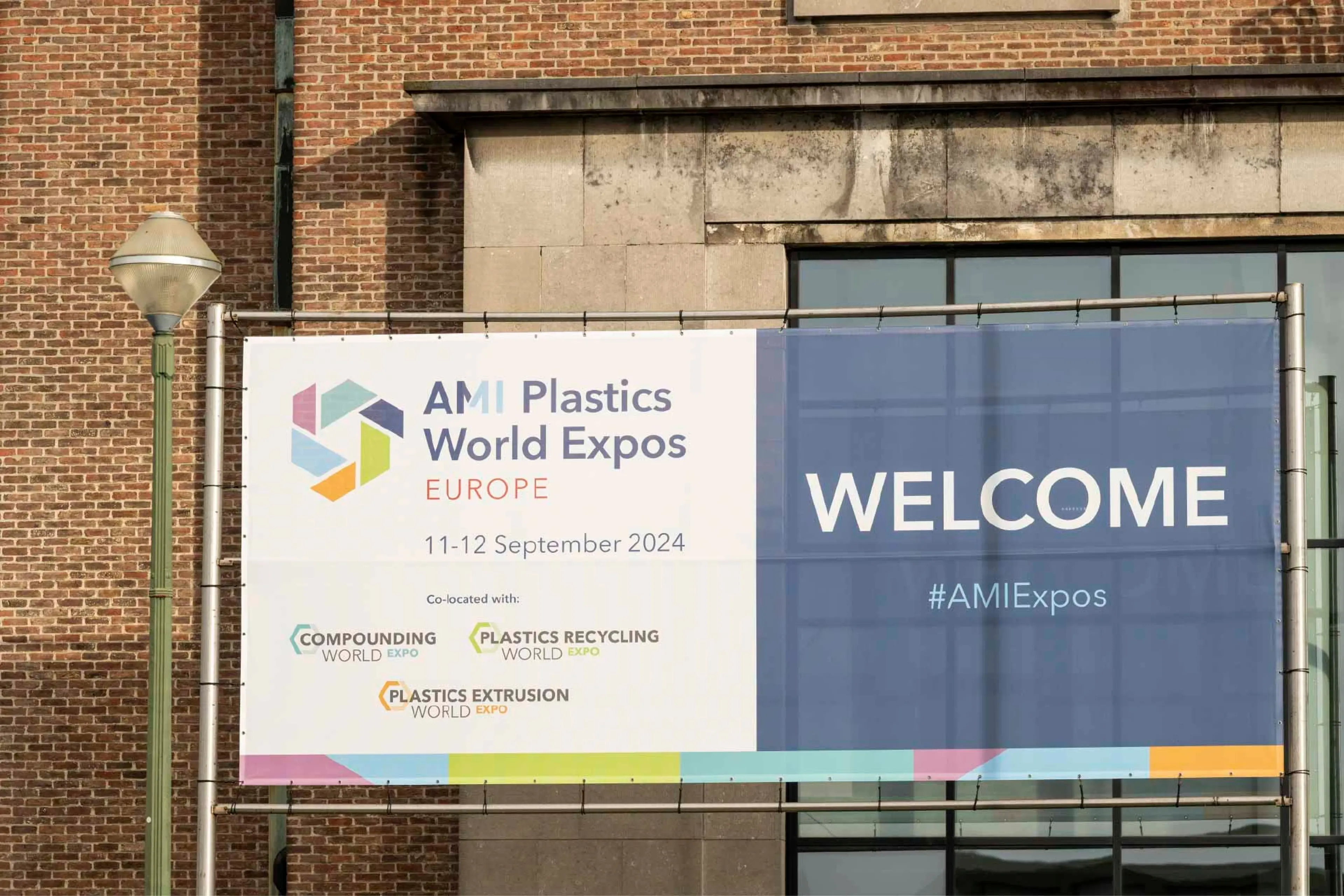 Wlecome sign at AMI's Plastics World Expo, Brussels 2024