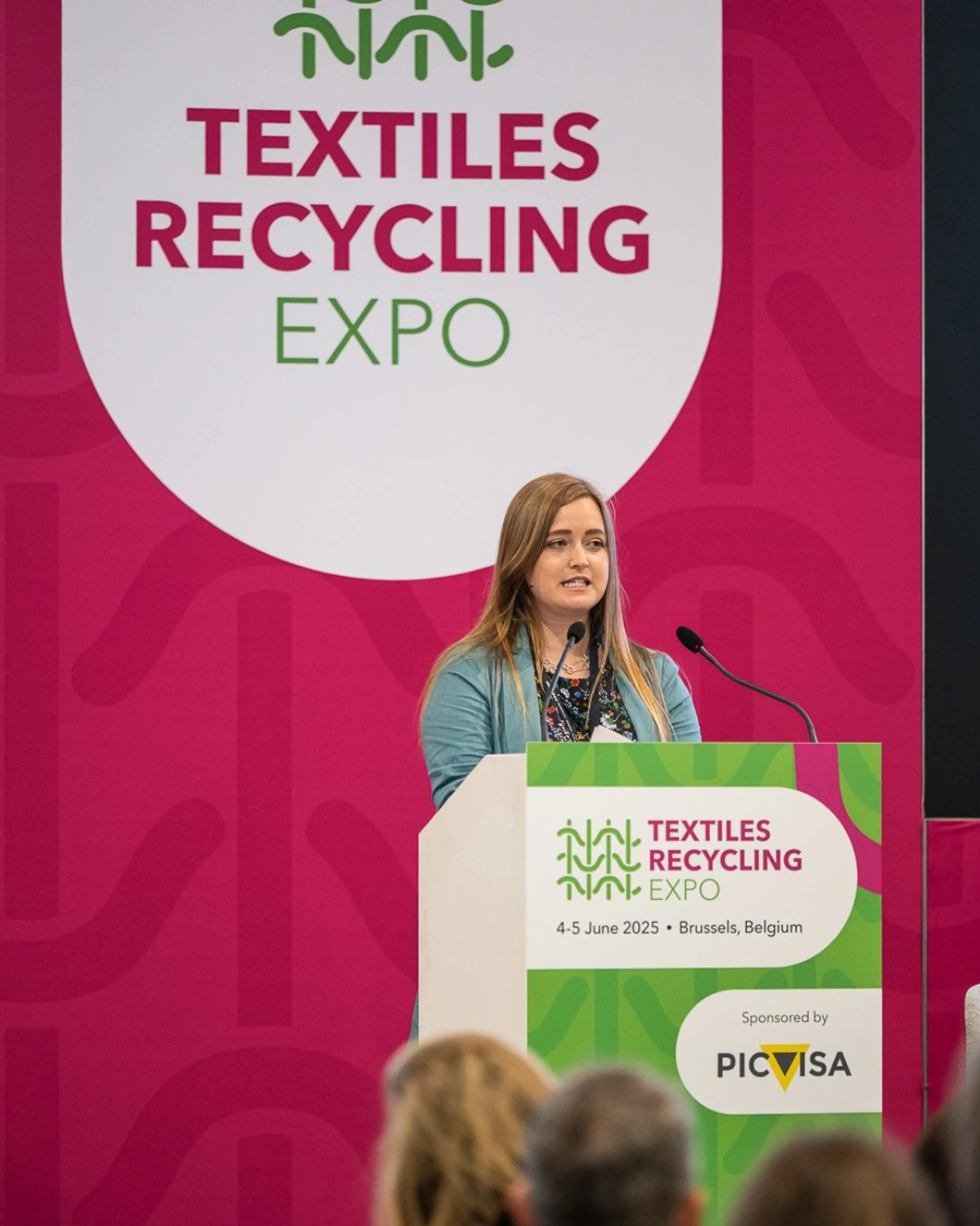 Olivia Poole presenting at AMI's Textiles Recycling Expo Europe 2025