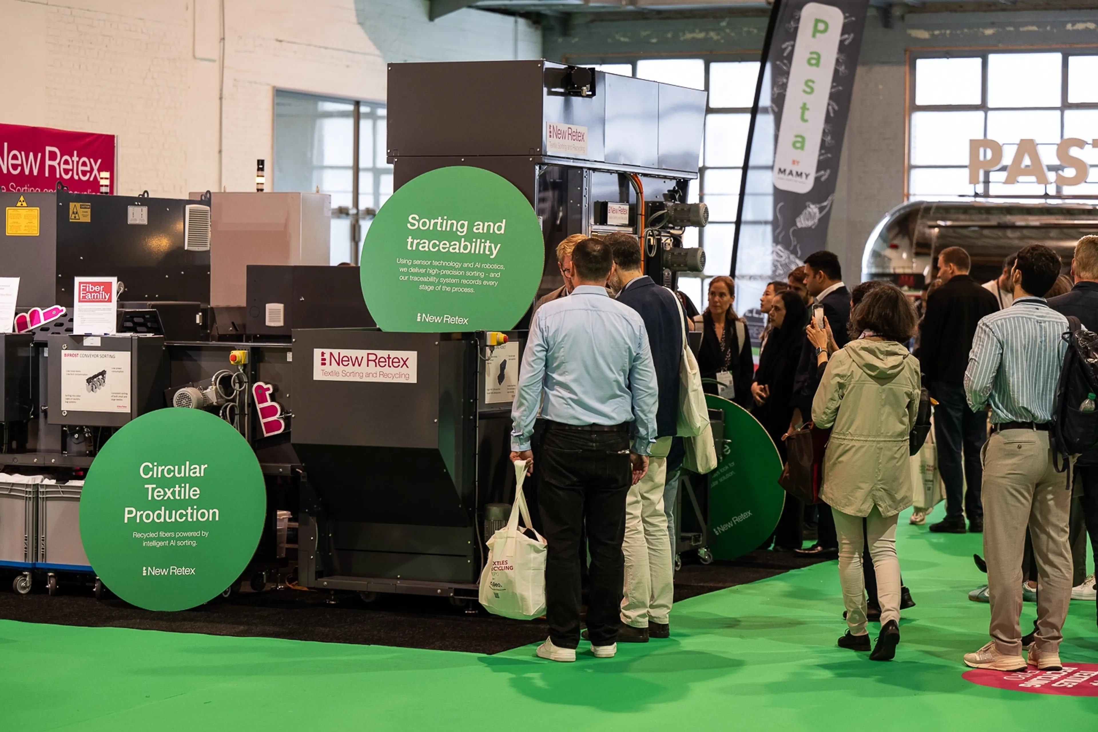 busy show floor at AMI's Textiles Recycling Expo Europe 2025