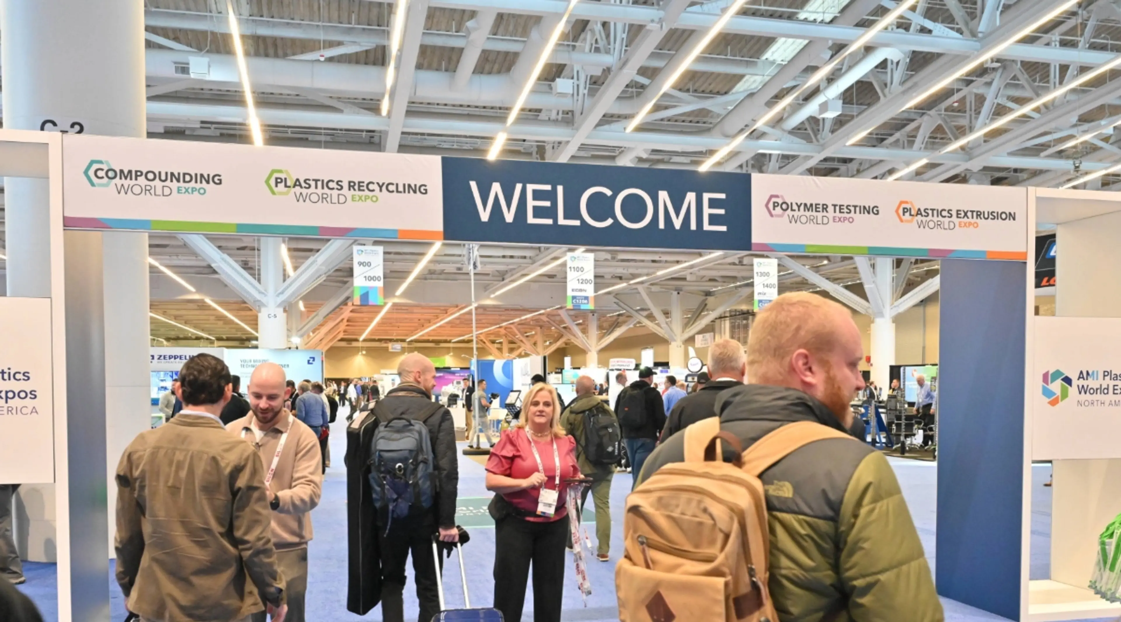 Welcome sign at AMI Plastics World Expos North America